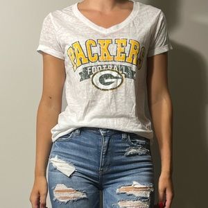 NFL team apparel brand. White shirt with packer logo. Medium
